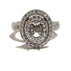 Beautiful double halo oval shape ring setting with  1.54Cts SI1 diamonds in 18kt White Gold ready to set the stone of your preference.