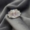 18Kt White Gold and 9.00 Ct Emerald Cut White Moissanite Ring