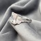 18Kt White Gold and 9.00 Ct Emerald Cut White Moissanite Ring